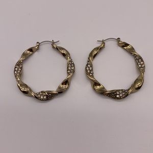 Gold Tone Twisted Hoop Earrings with Clear Rhinestones